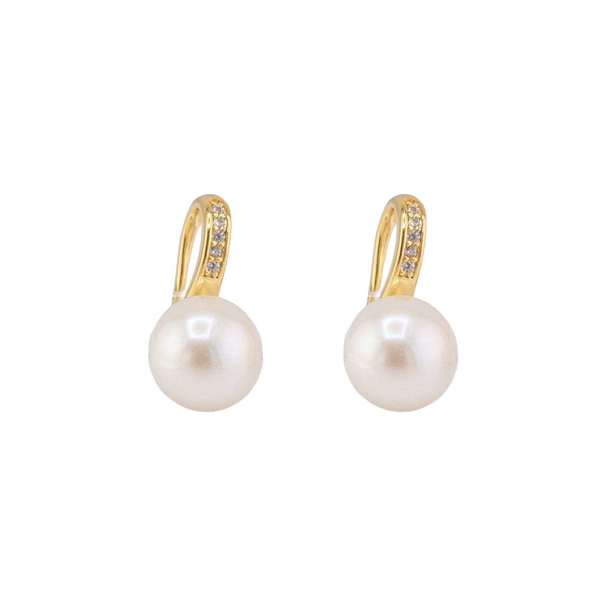 Pair of pearl earrings with gold hooks on a white background