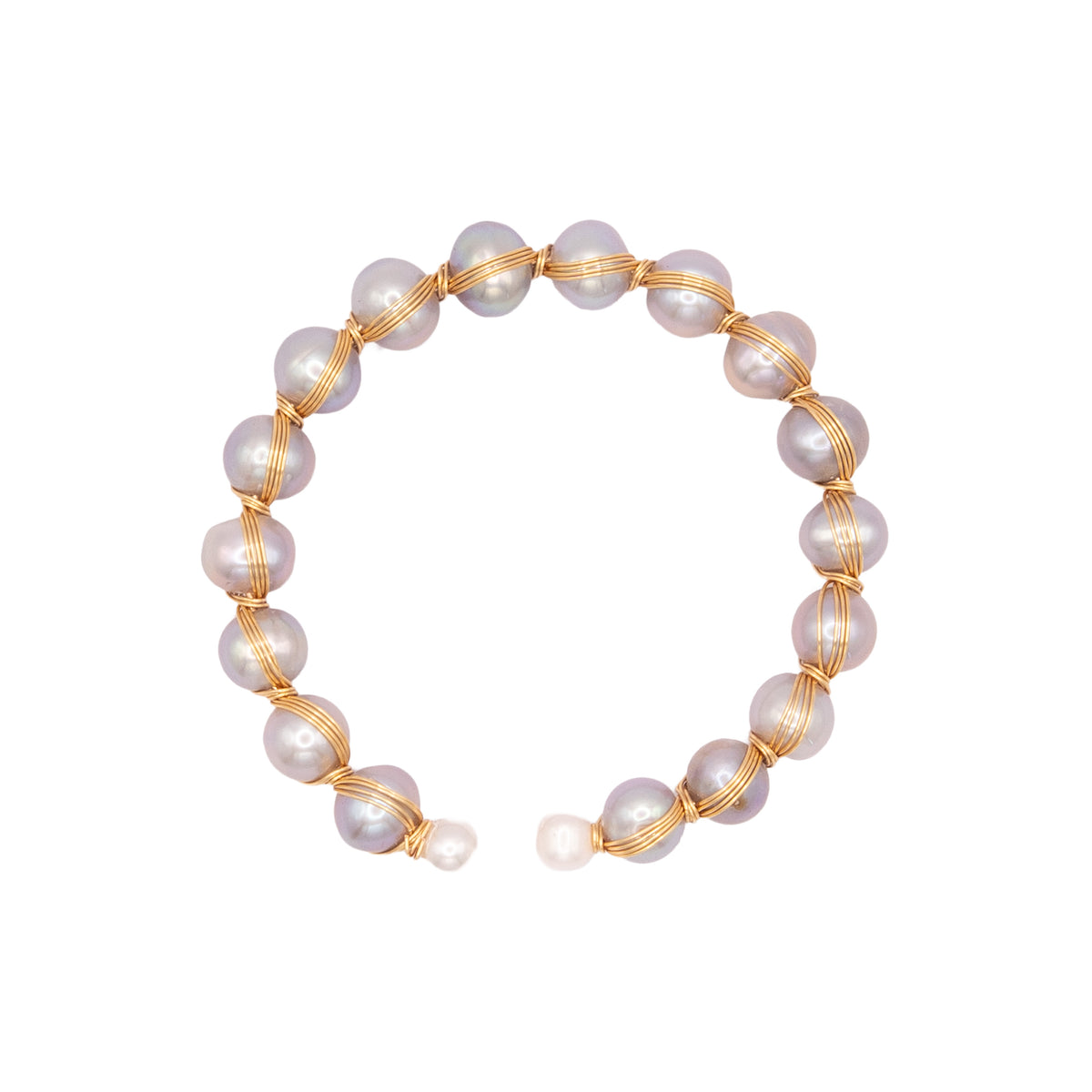 Pearl bracelet with gold wire on a white background